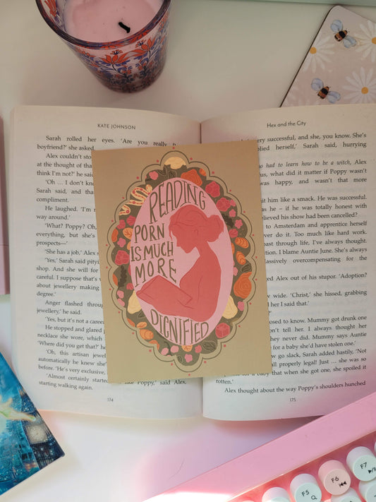 Reading P*rn is much more dignified postcard